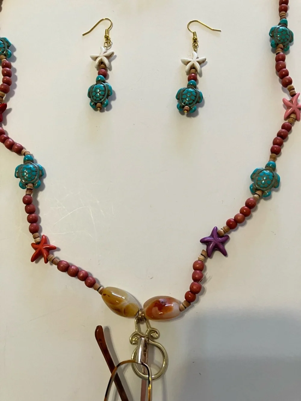 Super Fun Necklace and Earrings Used As A Eyeglass Holder